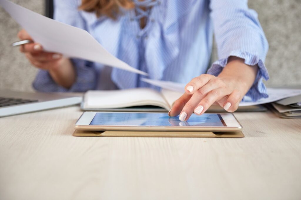 woman working with tablet at the office desk